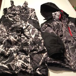 Boys snow jacket and bib pants.